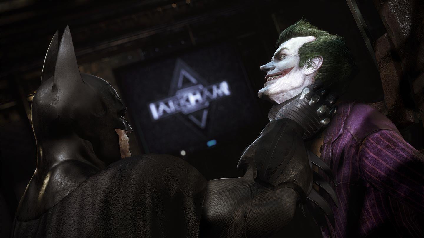 Batman Arkham Collection batman tient le joker à la gorge
