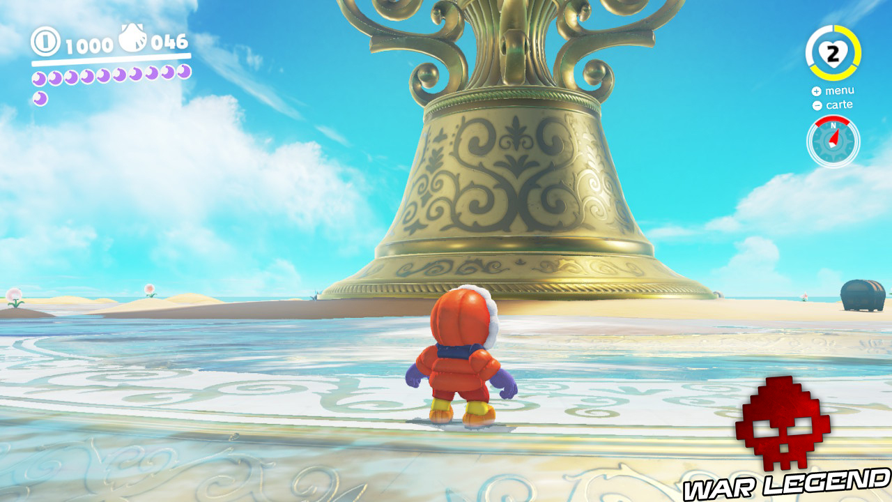 mario se tenant devant une immense flûte au pied ressemblant à une cloche