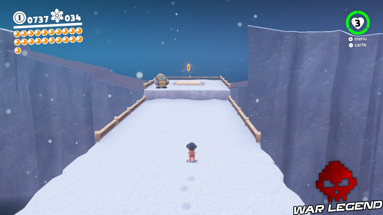 mario sprint sur une étendue de neige en direction d'une lune et d'un Flon