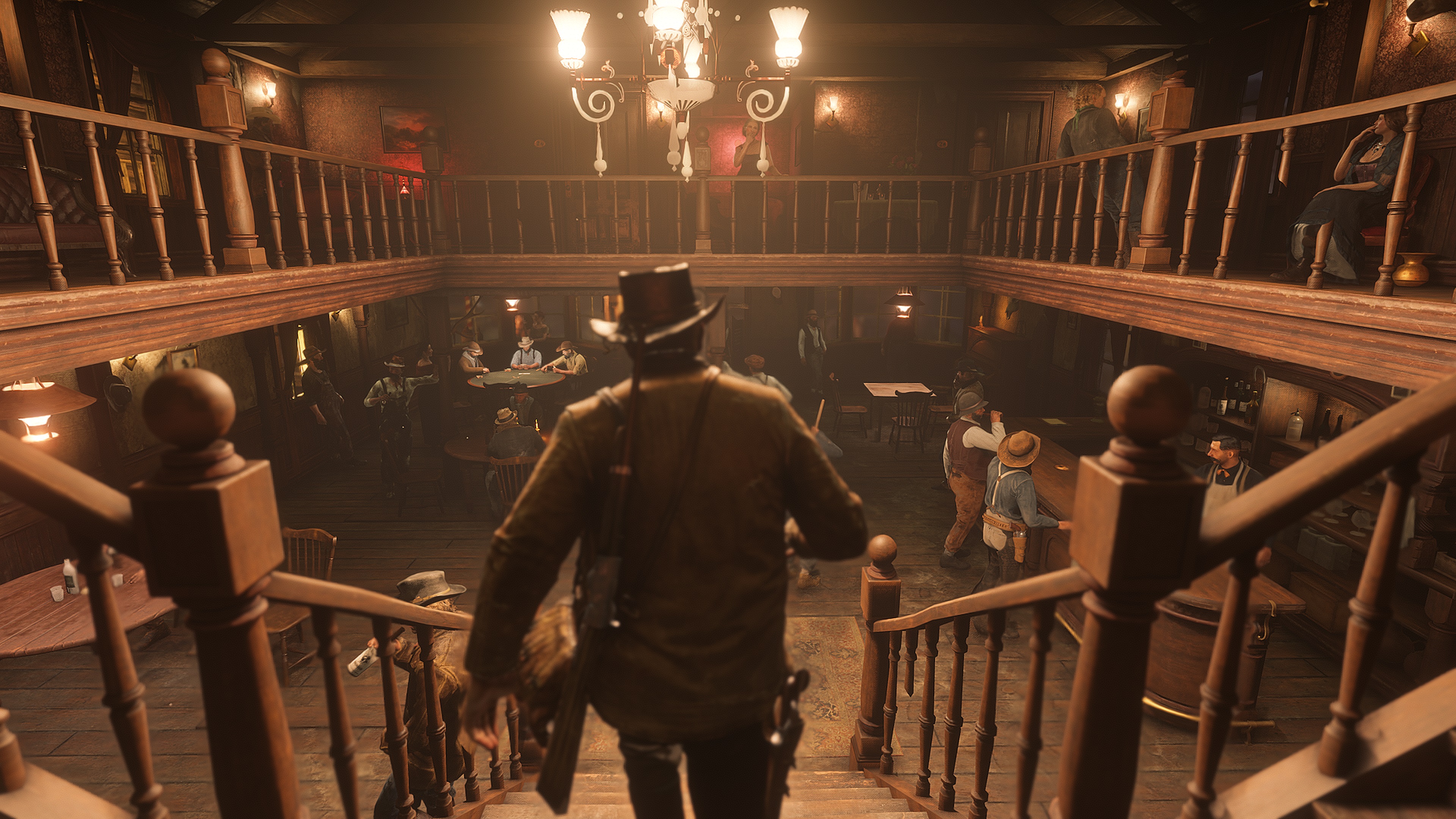 Red Dead Redemption 2 screenshot morgan descend les escaliers d'un saloon