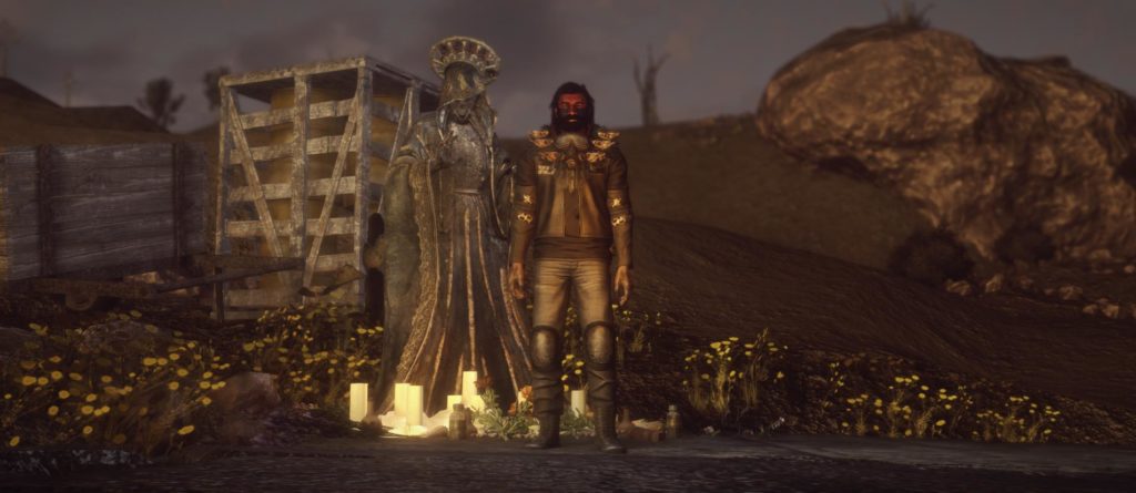 Un des personnages de New California devant une statue peu rassurante