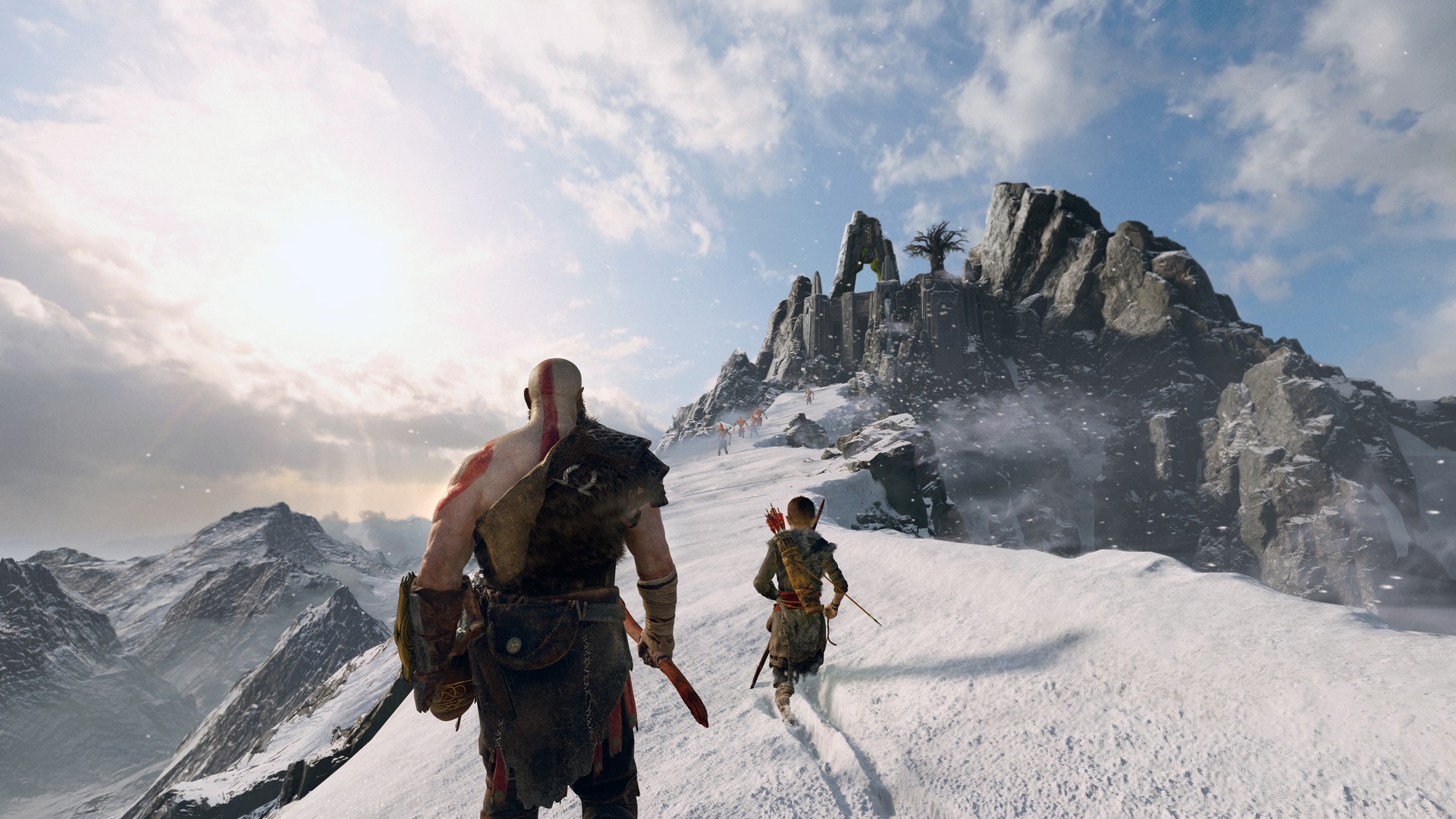 Kratos et Atreus avançant dans la neige