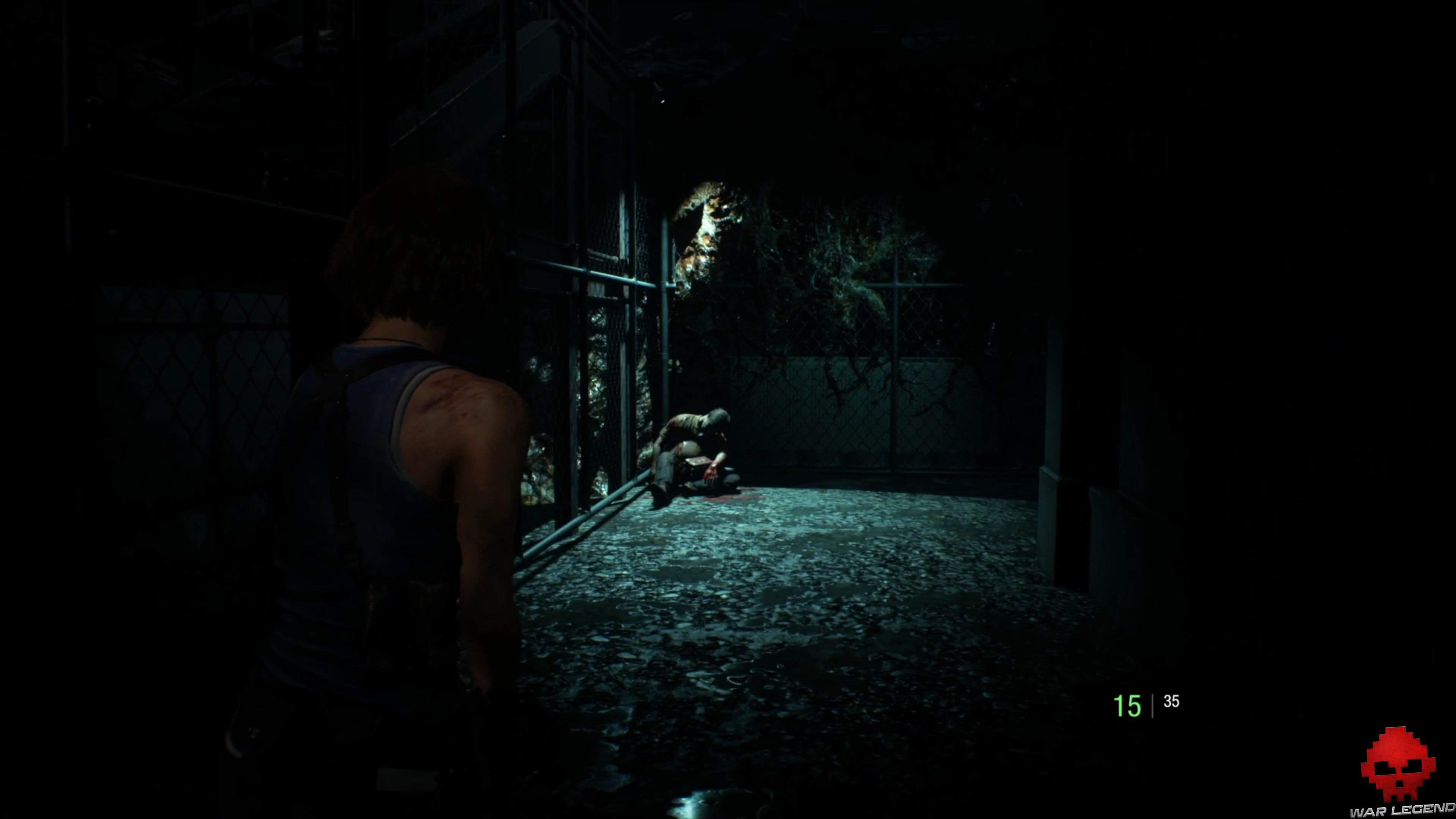 resident evil 3 cadavre adossé à un grillage