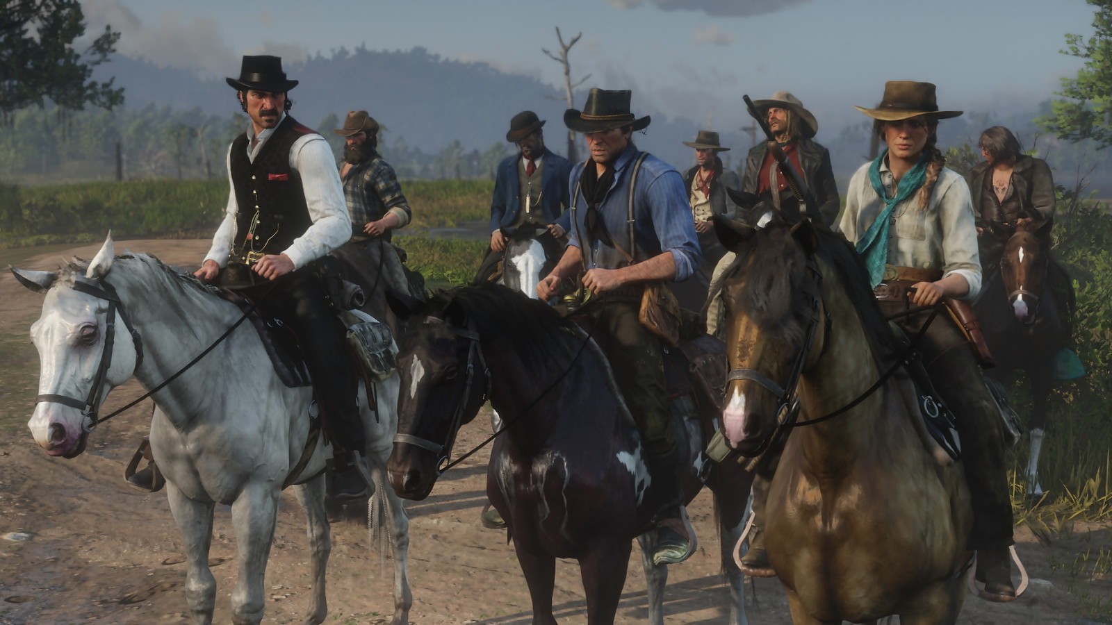 Plusieurs personnages de Red Dead Redemption 2 sur des chevaux
